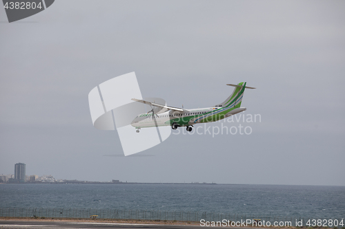 Image of ARECIFE, SPAIN - APRIL, 15 2017: ATR 72 of Binter landing at Lan