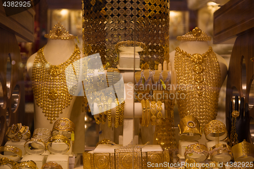 Image of gold jewelry in the shop window