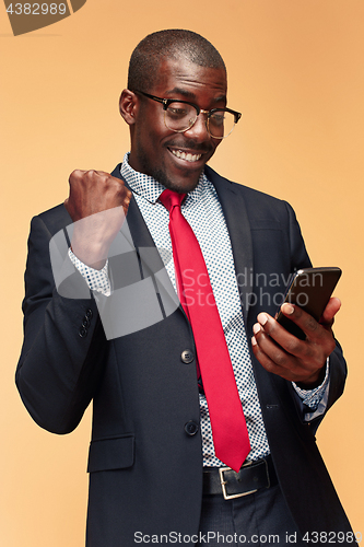 Image of Young african business man on the phone