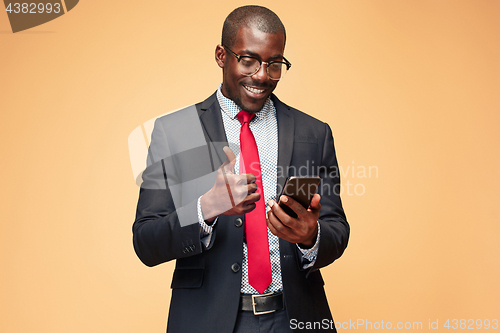 Image of Young african business man on the phone