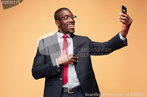 Image of Young african business man on the phone