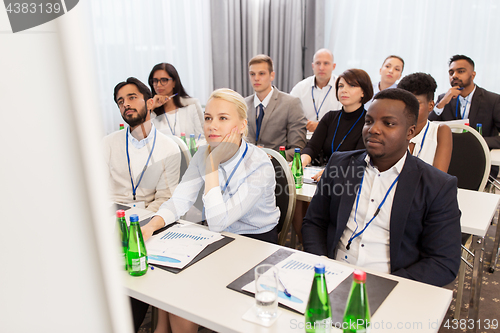 Image of happy business team at international conference