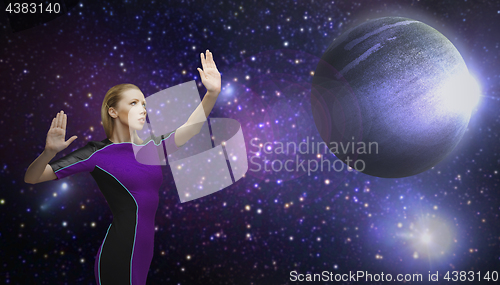 Image of futuristic woman over planet and stars in space