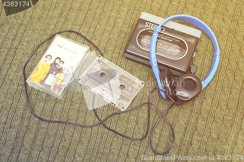 Image of Vintage walkman, PULP cassete and headphones.