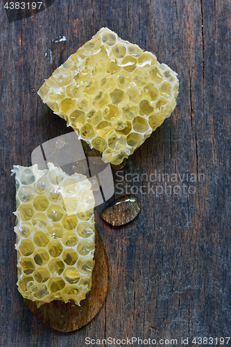 Image of Honeycomb on a vintage wooden table