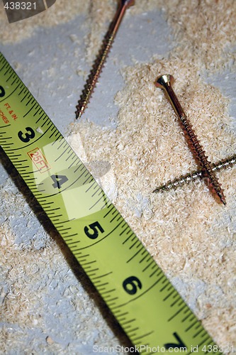 Image of Tape Measure and Wood Screws