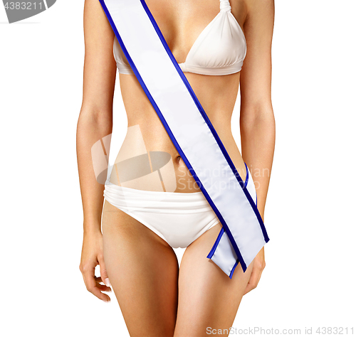 Image of part of woman with beauty contest tape