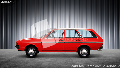 Image of red retro car at hight