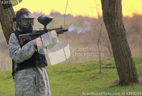 Image of Paintball player under attack