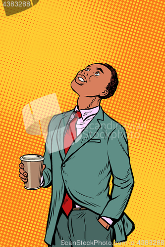 Image of African businessman drinking coffee and looking up