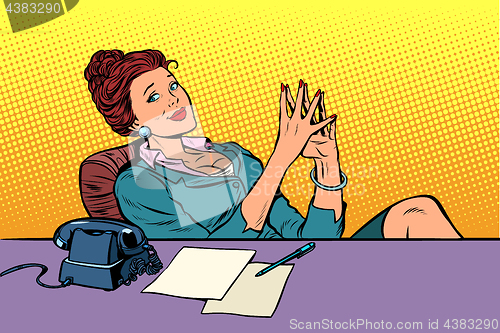Image of businesswoman boss sitting at the office Desk