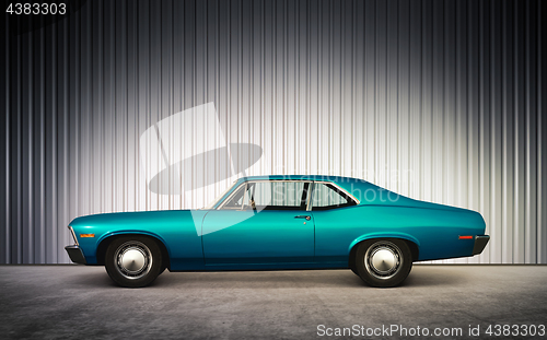 Image of blue retro car at hight