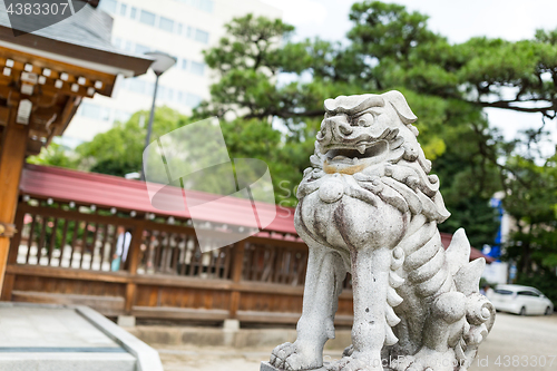 Image of Japanese temple with lion statue