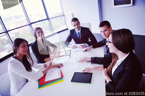 Image of business people in a meeting at office