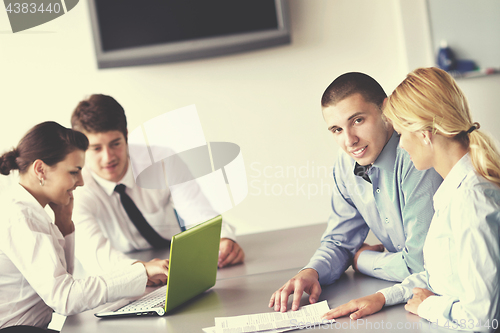 Image of business people in a meeting at office