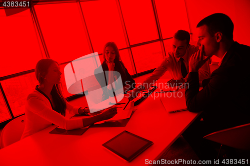 Image of business people in a meeting at office