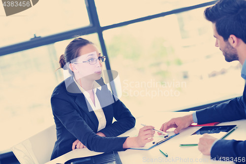 Image of business people in a meeting at office