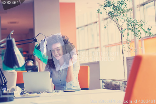 Image of young  business woman at office