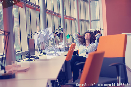 Image of young  business woman at office