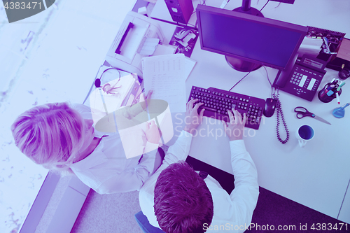 Image of business people in a meeting at office