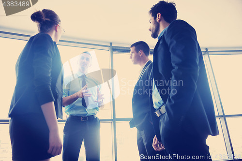 Image of business people in a meeting at office