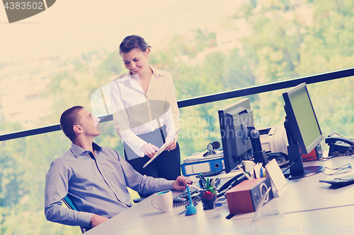 Image of business people in a meeting at office