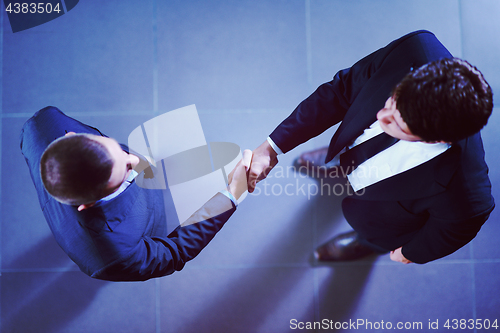 Image of business people making deal