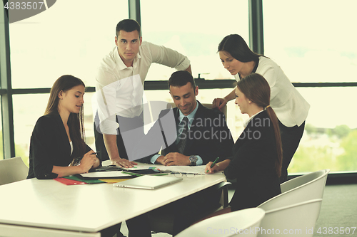 Image of business people group in a meeting at office