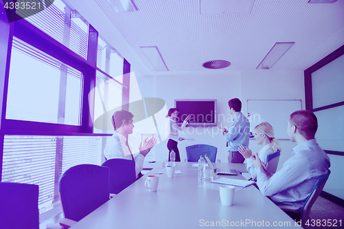 Image of business people in a meeting at office