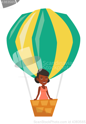 Image of Woman flying in hot air balloon.