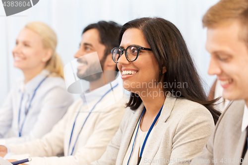 Image of happy business team at international conference