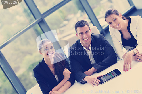 Image of business people in a meeting at office