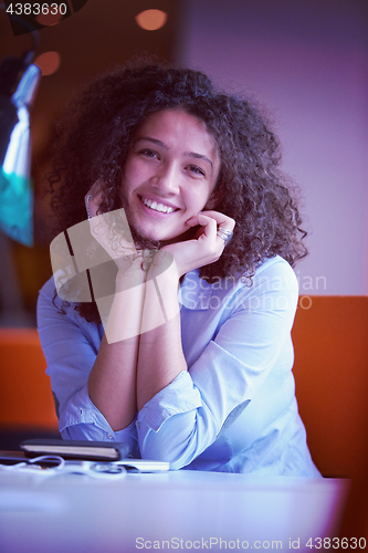 Image of young  business woman at office