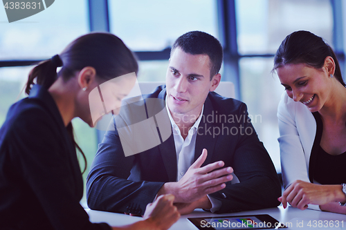 Image of business people in a meeting at office