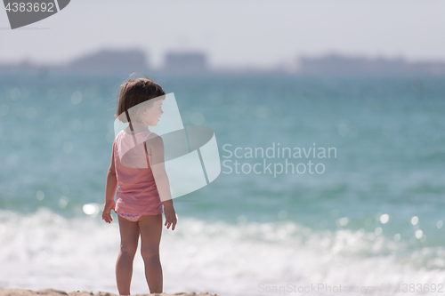 Image of little cute girl at beach