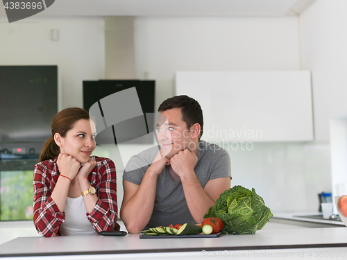 Image of Young couple in the kitchen