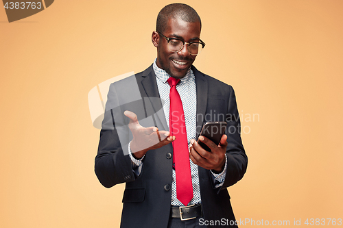 Image of Young african business man on the phone