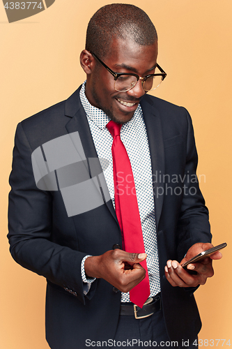 Image of Young african business man on the phone