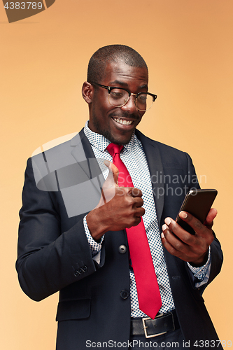 Image of Young african business man on the phone