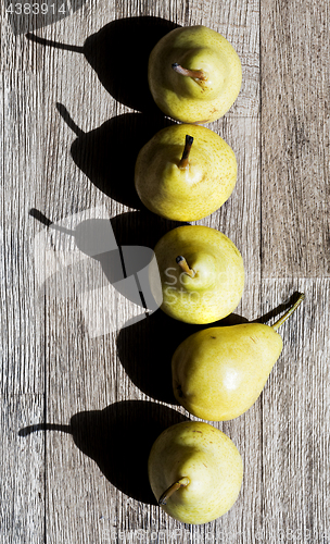 Image of Pears in a row. Top view