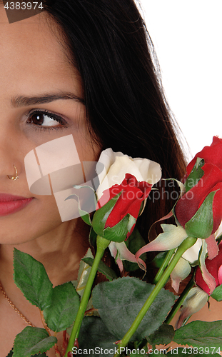 Image of Halve of a face of a woman with roses