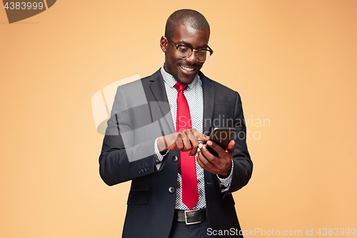 Image of Young african business man on the phone