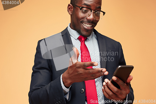 Image of Young african business man on the phone