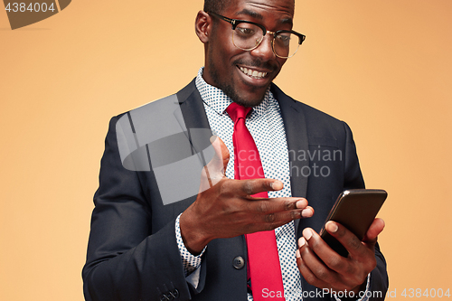 Image of Young african business man on the phone