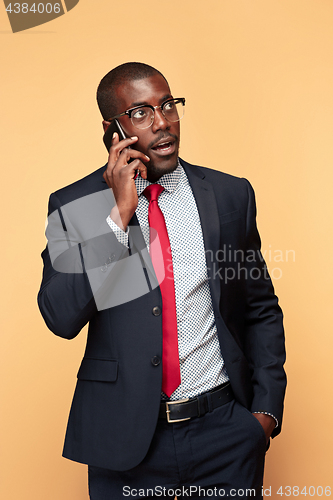 Image of Young african business man on the phone