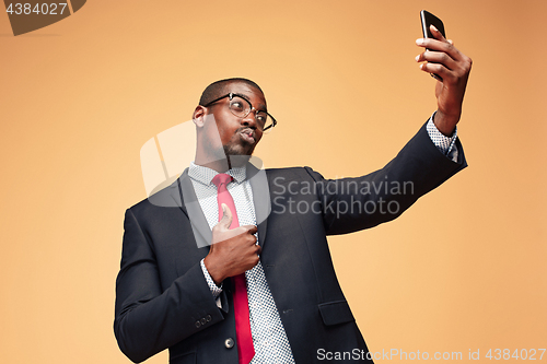 Image of Young african business man on the phone