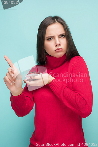 Image of Beautiful women holding small cake. Birthday, holiday.