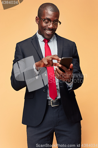 Image of Young african business man on the phone