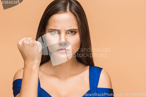 Image of Frustrated young woman at studio