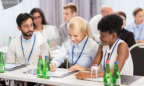 Image of happy business team at international conference
